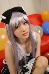 Rule 34 | 1girl, balloon, bow, cosplay, couch, dress, hair bow, photo (medium), red upholstery, ribbon, saya (cosplayer), silver hair
