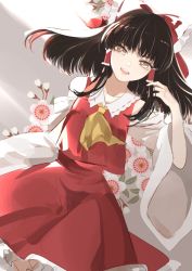 Rule 34 | 1girl, ascot, black hair, blunt bangs, bow, brown eyes, brown hair, collared shirt, commentary, detached sleeves, dutch angle, floating hair, floral background, flower, frilled bow, frilled shirt collar, frilled skirt, frills, grey background, hair bow, hair tubes, hakurei reimu, hand in own hair, hand up, highres, kerok (joniko1110), long hair, looking at viewer, open mouth, plum blossoms, red bow, red ribbon, red shirt, red skirt, ribbon, ribbon-trimmed collar, ribbon-trimmed sleeves, ribbon trim, ruffling hair, shirt, sidelocks, skirt, skirt set, solo, teeth, touhou, upper teeth only, white flower, wide sleeves, yellow ascot
