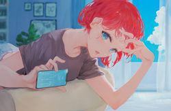 Rule 34 | 1girl, arm up, belt, blue eyes, cellphone, cloud, curtains, highres, holding, holding phone, indoors, kisei2, looking at viewer, lying, on stomach, open mouth, original, phone, plant, purple shirt, red hair, shirt, short hair, short sleeves, smartphone, solo, t-shirt