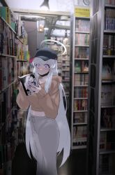 Rule 34 | 1girl, absurdres, black hat, black mask, blue archive, blush, book, brown hoodie, closed mouth, grey hair, grey pants, halo, hat, highres, himari (blue archive), holding, holding book, hood, hood down, hoodie, long hair, long sleeves, looking at viewer, manga (object), mask, mechanical halo, mouth mask, noa (blue archive), pants, photo background, plentyofempty, purple eyes, solo, surgical mask