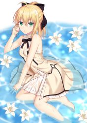 Rule 34 | 1girl, ahoge, artoria pendragon (all), artoria pendragon (fate), barefoot, black bow, black ribbon, blonde hair, bow, breasts, cleavage, dress, fate/unlimited codes, fate (series), flower, green eyes, hair between eyes, hair bow, hand in own hair, highres, lily (flower), long hair, looking at viewer, neck ribbon, parted lips, ponytail, ribbon, saber lily, shallow water, shino skk, sitting, sleeveless, sleeveless dress, small breasts, solo, strapless, strapless dress, water, white dress, white flower