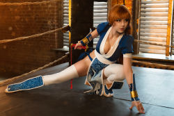 Rule 34 | 1girl, arm support, breasts, brown hair, cleavage, cosplay, dead or alive, female focus, fighting stance, full body, helly von valentine (disharmonica), indoors, kasumi (doa), kasumi (doa) (cosplay), large breasts, long hair, looking away, matching hair/eyes, medium breasts, pelvic curtain, photo (medium), ponytail, revealing clothes, rope, short sleeves, solo, sword, thighhighs, vambraces, wakizashi, weapon, white thighhighs, window shutter