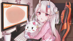 Rule 34 | chair, character name, commentary request, cray, creature, cup, desk, double bun, fang, from side, gaming chair, hair bun, hair ornament, highres, hololive, horns, indoors, keyboard (computer), long hair, looking at viewer, looking to the side, monitor, mug, multicolored hair, nakiri ayame, office chair, on chair, oni, parted lips, pink shirt, poyoyo (nakiri ayame), red eyes, red hair, shirt, silver hair, sitting, skin-covered horns, streaked hair, swivel chair, two side up, upper body, very long hair, virtual youtuber