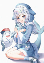 Rule 34 | 1girl, :d, absurdres, animal costume, animal hood, blue eyes, blue hair, blue hoodie, blue nails, blush, fins, fish tail, gawr gura, gawr gura (1st costume), highres, hololive, hololive english, hood, hoodie, hugging doll, hugging object, kinyouny, legs, medium hair, nail polish, no pants, open mouth, seiza, shark costume, shark hood, shark tail, shoes, sidelocks, simple background, sitting, smile, solo, tail, teeth, thighs, virtual youtuber, white background, white hair