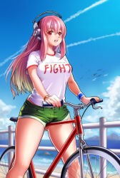 Rule 34 | 1girl, bicycle, blue sky, breasts, clothes writing, cloud, day, denim, denim shorts, dominico, female focus, green shorts, headphones, highres, large breasts, legs, long hair, looking at viewer, nitroplus, ocean, open mouth, pink hair, red eyes, shirt, short shorts, short sleeves, shorts, sky, solo, summer, super sonico, sweatband, taut clothes, taut shirt, thighs, watch, wristband