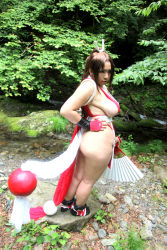 Rule 34 | ass, breasts, brown eyes, brown hair, chouzuki maryou, cosplay, hair ornament, hand fan, huge ass, large breasts, long hair, photo (medium), plump, ponytail, shiranui mai, shiranui mai (cosplay), sideboob, snk, the king of fighters, thick thighs, thighs, very long hair