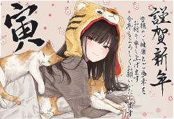 Rule 34 | 1girl, akipeko, animal hood, bad id, bad twitter id, black hair, blanket, blush, border, brown eyes, cat, commentary request, floral background, grey sweater, half-closed eyes, highres, hood, light smile, long hair, long sleeves, looking at viewer, lying, on stomach, original, outside border, pillow, sleeping, solo, sweater, tiger hood, translation request, under covers, white border