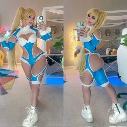 Rule 34 | 1girl, ass, bare shoulders, blonde hair, blue eyes, breasts, cellphone, cleavage cutout, clothing cutout, cosplay, from behind, highres, large breasts, leotard, long hair, phone, photo (medium), rainbow mika, rainbow mika (cosplay), real life, serinide, shoes, shoulder cutout, street fighter, thigh cutout, thong leotard, twintails, very long hair, wrestling outfit
