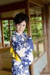 Rule 34 | 1girl, blurry, blurry background, breasts, brown eyes, brown hair, day, female focus, highres, japanese (nationality), japanese clothes, kimono, large breasts, light smile, looking at viewer, mole, photo (medium), short hair, solo, standing, teeth, yoshikawa aimi