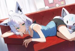 Rule 34 | 1girl, :o, animal ears, black shorts, blue camisole, breasts, camisole, cleavage, commentary request, couch, curtains, fox ears, fox girl, fox tail, green eyes, highres, hololive, indoors, looking at viewer, lying, medium breasts, melreon, on couch, on stomach, shirakami fubuki, shorts, solo, tail, thighs, virtual youtuber, white hair