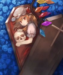 Rule 34 | 1girl, ascot, bad id, bad twitter id, blonde hair, blue flower, blue rose, coffin, commentary request, cross, crystal, eyelashes, flandre scarlet, flower, from above, hair between eyes, hat, hat ribbon, holding, holding skull, in container, looking at viewer, lying, mob cap, on side, one side up, parted lips, pointy ears, puffy short sleeves, puffy sleeves, red eyes, red ribbon, red skirt, red vest, ribbon, rose, shirt, short sleeves, skirt, skirt set, skull, slit pupils, solo, suminagashi, touhou, vest, white hat, white shirt, wing collar, wings, yellow ascot