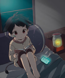 1boy animal_ears bandaid bandaid_on_face bed_sheet black_hair book candle cellphone child cow_ears cow_tail earphones highres holding holding_book indoors male_focus nemui_(nemuriyagi) original phone pillow reading short_hair sitting smartphone solo tail