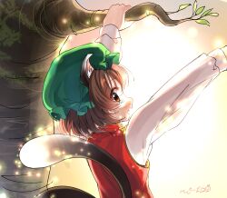 Rule 34 | 1girl, animal ears, arms up, backlighting, bloom, brown eyes, brown hair, cat ears, cat tail, chen, commentary request, fang, gold trim, green hat, hanging from tree, hat, highres, light particles, long sleeves, looking at viewer, looking back, mikan (user zsyg8485), mob cap, multiple tails, nekomata, open mouth, overexposure, profile, red vest, sideways glance, solo, tail, touhou, two tails, vest