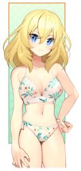 Rule 34 | 1girl, bikini, blonde hair, blue eyes, border, breasts, cleavage, closed mouth, commentary, cowboy shot, floral print, girls und panzer, gradient background, green background, hand on own hip, hand on own thigh, looking at viewer, medium breasts, medium hair, messy hair, navel, oshida (girls und panzer), outside border, print bikini, smile, solo, standing, swimsuit, tan (inka), white bikini