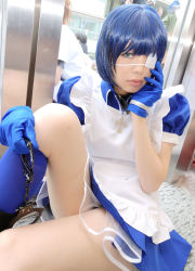 Rule 34 | 1girl, apron, asian, blue eyes, blue gloves, blue hair, blue socks, boots, collar, color contacts, cosplay, cross, cuffs, dutch angle, eyepatch, gloves, handcuffs, highres, ikkitousen, indoors, kneehighs, looking at viewer, maid, maid apron, namada, on floor, photo (medium), puffy short sleeves, puffy sleeves, ryomou shimei, ryomou shimei (cosplay), short sleeves, sitting, socks, solo