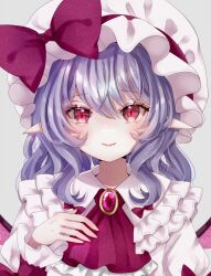 Rule 34 | 1girl, adapted costume, alternate hairstyle, ascot, blue hair, blush, bow, closed mouth, commentary, crossed bangs, eyelashes, frilled shirt collar, frills, grey background, hair between eyes, hand up, hat, hat bow, huge bow, jaku sono, lips, medium hair, mob cap, pointy ears, red ascot, red bow, red eyes, remilia scarlet, shirt, sidelocks, simple background, smile, solo, touhou, tsurime, upper body, wavy hair, white headwear, white shirt