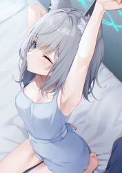 Rule 34 | 1girl, absurdres, animal ear fluff, animal ears, armpits, arms up, blue archive, blue camisole, blue eyes, blue halo, blue shorts, camisole, commentary request, grey hair, halo, highres, long hair, on bed, one eye closed, sasakichi (ssk chi), seiza, shiroko (blue archive), shorts, sitting, solo, stretching, wolf ears