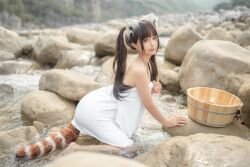 Rule 34 | 1girl, anal tail, animal ears, asian, bathing, black hair, bucket, butt plug, chinese (nationality), chunmomo0127, closed mouth, fake animal ears, fake tail, in water, kneeling, outdoors, real life, rock, tail, towel, twintails, water