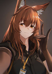 1girl animal_ear_fluff animal_ears arknights black_shirt breasts brown_background brown_eyes brown_gloves brown_hair closed_mouth collared_shirt elbow_gloves fox_ears fox_shadow_puppet franka_(arknights) gloves highres id_card krirk large_breasts long_hair looking_at_viewer selfie shirt simple_background smile solo upper_body