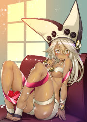 Rule 34 | 1girl, :p, ass, belt bra, blonde hair, box, breasts, brown eyes, chocolate, chocolate on face, cleavage, dark-skinned female, dark skin, feet, food, food on face, full body, guilty gear, hat, heart-shaped box, hobby (kento), legs, medium breasts, ramlethal valentine, ribbon, sitting, solo, tan, toes, tongue, tongue out, underboob, valentine