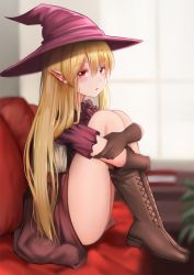 Rule 34 | 1girl, blonde hair, blurry, blurry background, blush, boots, brown footwear, brown gloves, cangmi, couch, cross-laced footwear, dress, elf, from side, gloves, hat, hugging own legs, indoors, knees up, long hair, looking at viewer, original, parted lips, pointy ears, red eyes, room, short sleeves, sitting, solo, window, witch hat