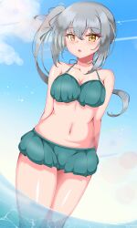 1girl absurdres alternate_breast_size arms_behind_back bikini bikini_skirt blue_sky breasts brown_eyes cloud commentary_request contrail cowboy_shot day frilled_bikini frills green_bikini grey_hair highres itsuya_(hmizugucti) kantai_collection kasumi_(kancolle) kasumi_kai_ni_(kancolle) kasumi_kai_ni_(swimsuit)_(kancolle) looking_at_viewer medium_breasts navel outdoors side_ponytail sky solo swimsuit variant_set wading water