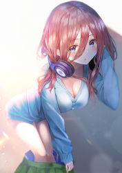 Rule 34 | 1girl, :o, blue cardigan, blue eyes, breasts, cardigan, cleavage, clothes pull, collarbone, go-toubun no hanayome, green skirt, headphones, headphones around neck, highres, large breasts, long sleeves, looking at viewer, nakano miku, open mouth, skirt, skirt pull, solo, thighs, yk (pixiv43531291)