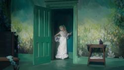 Rule 34 | 1girl, commentary request, door, dress, elf, flower, frieren, green theme, indoors, long dress, mural, off shoulder, open door, pointy ears, shawl, solo, sousou no frieren, standing, table, twintails, white dress, white hair, wide shot, yao liao wang