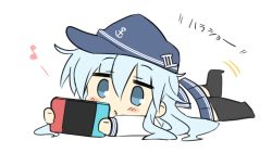 Rule 34 | 1girl, anchor symbol, black thighhighs, blue eyes, blue hat, blue sailor collar, commentary request, flat cap, handheld game console, hat, hibiki (kancolle), hizuki yayoi, holding, holding handheld game console, kantai collection, long hair, lying, nintendo switch, on stomach, playing games, pleated skirt, sailor collar, silver hair, simple background, skirt, solo, thighhighs, white background