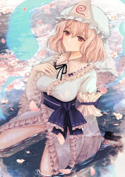 Rule 34 | 1girl, black ribbon, blue hat, blue kimono, blue sash, cherry blossoms, closed mouth, commentary request, flower, frilled kimono, frilled sleeves, frills, full body, ghost, hand on own chest, hand up, hat, highres, hitodama, japanese clothes, kimono, looking at viewer, medium hair, mob cap, partially submerged, pink hair, red eyes, ribbon, ripples, saigyouji yuyuko, sash, sleeve garter, solo, soukou (artist), touhou, triangular headpiece, twitter username, water, white flower