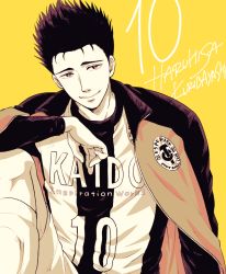 Rule 34 | 1boy, ao ashi, black hair, character name, ika choco, jacket, jacket on shoulders, knee up, kuribayashi haruhisa, looking at viewer, male focus, simple background, smile, soccer uniform, solo, spiked hair, sportswear, yellow background