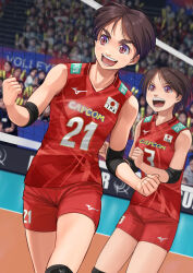 Rule 34 | 2girls, brown eyes, brown hair, capcom, clenched hand, clothes writing, company name, crowd, elbow sleeve, highres, indoors, mizuno (brand), multiple girls, original, otsu natsu, playing sports, red shirt, red shorts, shirt, shirt writing, short hair, shorts, sleeveless, sportswear, standing, thick eyebrows, uniform, volleyball, volleyball net, volleyball uniform