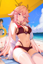 Rule 34 | 2girls, 95---, animal ears, bare shoulders, beach, beach towel, bikini, blurry, blurry background, breasts, commentary, day, fox ears, genshin impact, grin, hair ornament, highres, long hair, looking at viewer, medium breasts, multiple girls, navel, pink hair, purple eyes, red bikini, sitting, smile, stomach, swimsuit, thighhighs, thighs, towel, very long hair, white thighhighs, yae miko