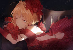 Rule 34 | 10s, 1girl, ;), ahoge, backless dress, backless outfit, blonde hair, bow, breasts, candy (pixiv15231759), couch, dress, elbow gloves, fate/extra, fate (series), flower, gloves, green eyes, hair bow, hair flower, hair ornament, highres, looking at viewer, lying, medium breasts, nero claudius (fate), nero claudius (fate) (all), nero claudius (fate/extra), official alternate costume, on stomach, one eye closed, red dress, red flower, red gloves, ribbon, short hair, sideboob, smile, solo, striped bow, striped ribbon