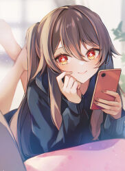 Rule 34 | 1girl, 7aka ne11, alternate costume, barefoot, black hoodie, bloom, blurry, blurry background, blush, brown hair, cellphone, chinese commentary, closed mouth, commentary, contemporary, fingernails, flower-shaped pupils, genshin impact, hair between eyes, hand on own face, highres, holding, holding phone, hood, hood down, hoodie, hu tao (genshin impact), indoors, legs up, long fingernails, long hair, long sleeves, looking at viewer, lying, nail polish, on stomach, phone, red eyes, red nails, sidelocks, smartphone, smile, solo, symbol-shaped pupils, twintails