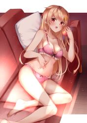Rule 34 | 1girl, :o, apple, bare shoulders, barefoot, black ribbon, blonde hair, blush, bra, breasts, cleavage, commentary, couch, food, fruit, hair flaps, hair ribbon, highres, holding, holding food, holding fruit, kantai collection, long hair, looking at viewer, lying, mashiro aa, medium breasts, on side, panties, pillow, pink bra, pink panties, red eyes, ribbon, solo, symbol-only commentary, underwear, underwear only, yuudachi (kancolle), yuudachi kai ni (kancolle)