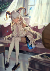 1girl, animal ears, arknights, bangs, bare shoulders, beeswax (arknights), beeswax (weisser sand) (arknights), black footwear, black pants, bug, butterfly, closed mouth, couch, curtains, dark-skinned female, dark skin, day, eyebrows visible through hair, full body, goat ears, goat girl, goat horns, hands on own cheeks, hands on own face, highres, horns, indoors, insect, jacket, light particles, long hair, long sleeves, looking at viewer, natsuba002, official alternate costume, on couch, open clothes, open jacket, pants, phonograph, silver hair, sitting, solo, sunlight, thighhighs, very long hair, white jacket, white legwear, yellow eyes