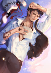 1boy animal arm_tattoo black_cat black_hair black_pants book cat chest_tattoo closed_mouth collarbone commentary_request facial_hair goatee highres holding holding_book katana long_sideburns looking_ahead lying male_focus messy_hair on_back one_piece pants pectoral_cleavage pectorals rami_rz sideburns solo sword tassel tattoo trafalgar_law twitter_username unworn_headwear weapon