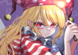 Rule 34 | 1girl, american flag dress, blonde hair, closed mouth, clownpiece, fairy wings, frown, hat, highres, holding, holding torch, jester cap, long hair, looking at viewer, neck ruff, pointy ears, polka dot, purple background, purple hat, red eyes, short sleeves, simple background, solo, star (symbol), striped, torch, touhou, tsune (tune), upper body, wings