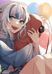 Rule 34 | 1girl, :d, absurdres, balloon, blue eyes, blue hair, blue hoodie, blue nails, commentary, drawstring, english commentary, feet out of frame, gawr gura, gawr gura (1st costume), grey hair, hair ornament, highres, hololive, hololive english, hood, hood down, hoodie, hugging object, knees up, long hair, long sleeves, looking at viewer, mittsu, multicolored hair, nail polish, open mouth, sharp teeth, smile, solo, streaked hair, teeth, twitter username, virtual youtuber, wide sleeves