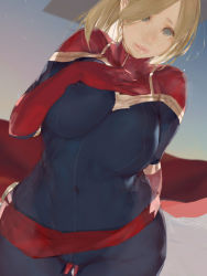 Rule 34 | 1girl, animification, between legs, blonde hair, blue eyes, bodysuit, breast suppress, breasts, cape, captain marvel, carol danvers, commentary request, covered erect nipples, covered navel, gloves, hair over one eye, hand between legs, hand on own chest, highres, large breasts, lips, long hair, marvel, ms marvel, mumaya, plump, red gloves, sash, solo, superhero costume, wide hips