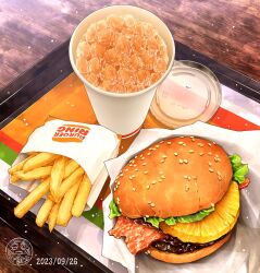 artist_logo bacon brand_name_imitation burger burger_king commentary_request cup dated disposable_cup fast_food food food_focus french_fries fruit meat no_humans ooranokohaku original pineapple pineapple_slice soda still_life table tray wooden_table