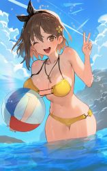 Rule 34 | 1girl, ;d, atelier (series), atelier ryza, atelier ryza 2, ball, beachball, bikini, black ribbon, blue sky, breasts, brown eyes, brown hair, cloud, dutch angle, highres, hood (james x), jewelry, key, key necklace, large breasts, necklace, ocean, one eye closed, open mouth, reisalin stout, ribbon, sky, smile, solo, strap gap, swimsuit, thigh gap, v, wading, water, yellow bikini