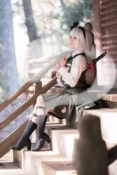 Rule 34 | 1girl, absurdres, asagi himari44, black footwear, black hairband, black socks, cosplay photo, expressionless, from side, green skirt, green vest, grey eyes, hairband, highres, konpaku youmu, konpaku youmu (ghost), outdoors, photo (medium), sheath, sheathed, shirt, short hair, shrine, sitting, sitting on stairs, skirt, socks, solo, stairs, sunlight, sword, touhou, vest, weapon, weapon on back, white hair, white shirt