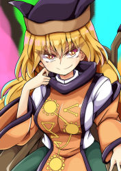 Rule 34 | 1girl, black headwear, blonde hair, breasts, chair, closed mouth, constellation print, detached sleeves, green skirt, hair between eyes, keyaki chimaki, large breasts, long hair, looking at viewer, matara okina, multicolored background, shirt, sitting, skirt, smile, solo, tabard, touhou, v-shaped eyebrows, wheelchair, white shirt, wide sleeves, yellow eyes