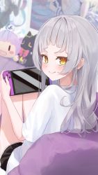Rule 34 | &gt;:), 1girl, absurdres, bad id, bad pixiv id, blush, character doll, from behind, hair down, handheld game console, highres, hiraki noboru, holding, holding handheld game console, hololive, long hair, looking at viewer, looking back, murasaki shion, nintendo switch, short eyebrows, silver hair, sitting, smile, smug, solo, straight hair, v-shaped eyebrows, virtual youtuber, yellow eyes