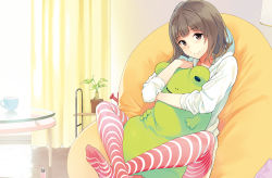 Rule 34 | 1girl, bean bag, bean bag chair, blush, brown eyes, brown hair, cup, curtains, feet, feet on toy, hood, hoodie, hugging doll, hugging object, kuu-doll, leg lock, looking at viewer, nail polish bottle, no shoes, plant, potted plant, red thighhighs, sasamori tomoe, sitting, smile, solo, striped clothes, striped thighhighs, stuffed animal, stuffed frog, stuffed toy, table, thighhighs, watering can
