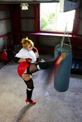 Rule 34 | 1girl, asian, blonde hair, blue eyes, boxing ring, breasts, chouzuki maryou, cosplay, fingerless gloves, gloves, highres, large breasts, miss spencer, miss spencer (cosplay), photo (medium), punching bag, rumble roses, rumble roses xx, solo