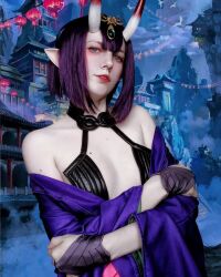 Rule 34 | 1girl, breasts, cosplay, fate/grand order, fate (series), female focus, highres, horns, moon usagi, photo (medium), pointy ears, purple eyes, purple hair, russian (nationality), short hair, shuten douji (fate), skin-covered horns, small breasts, solo, standing