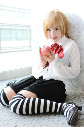 Rule 34 | 1girl, amane misa, amane misa (cosplay), apple, asian, blonde hair, breasts, cosplay, death note, food, fruit, high heels, kipi-san, long hair, looking at viewer, mole, photo (medium), shoes, sitting, small breasts, solo, striped, thighhighs, wariza